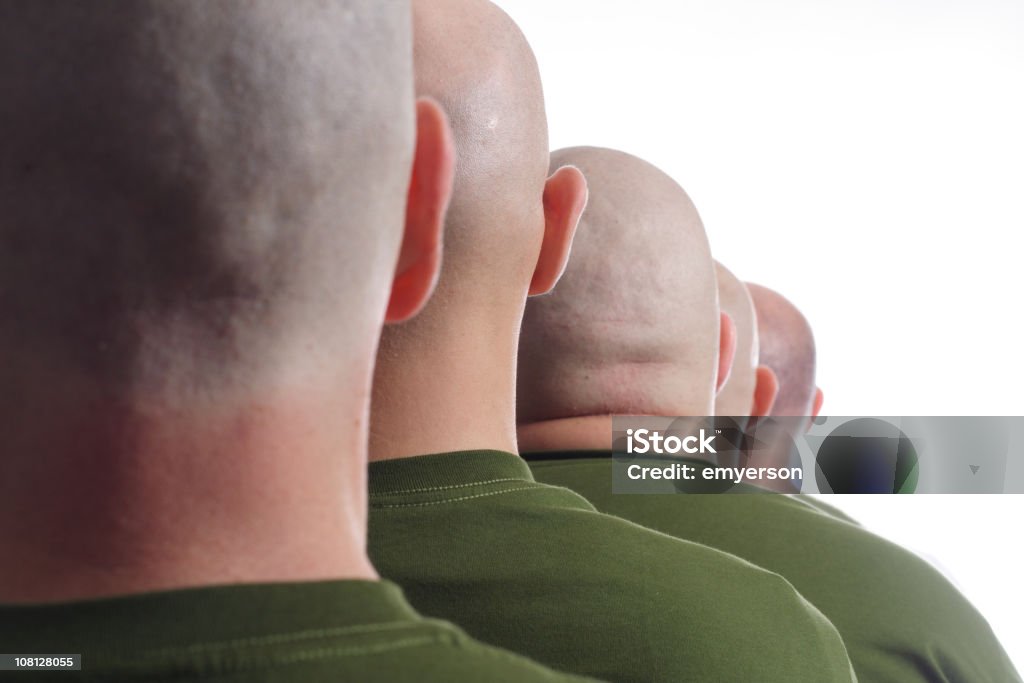 Macho linha de soldados com cabeças eliminados - Royalty-free Esperar na fila Foto de stock