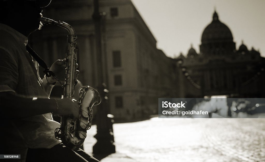Saxophone Player City of Rome  Winter Stock Photo