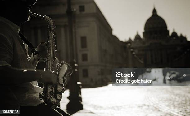 Saxophone Player City Of Rome Stock Photo - Download Image Now - Winter, Jazz Music, Saxophone
