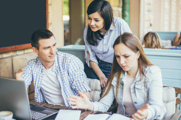 istock Young creative people working on a business project together 1081281900