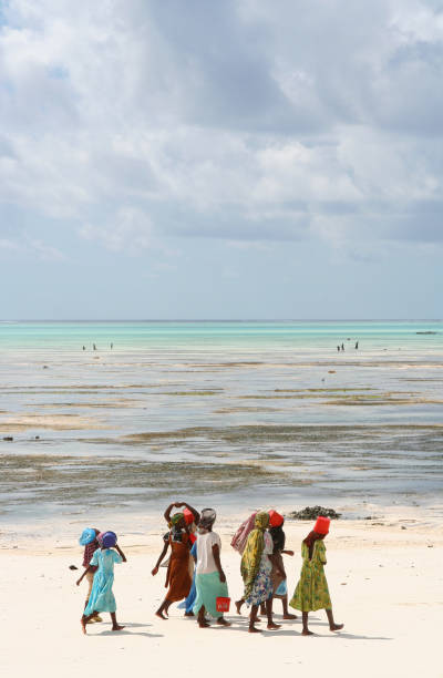 White sand beach with blue water and sky in background, north of Toliara, at Ambatomilo lagoon in South West Madagascar. Nice for background with lot of copy space.