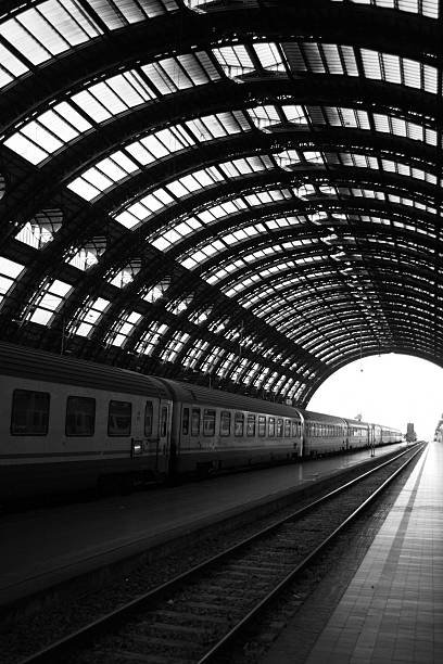 Zurich with a large trackfield of the federal Railways (SBB) and a driving through high speed train. The beautiful image was captured during dusk in autumn season.