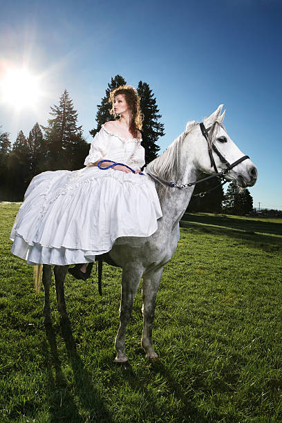 istock Curly Haired Brunette in White Colonial Dress 108128528