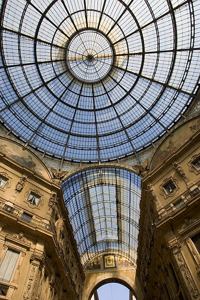 Looking Up at Glass Dome of Galleria in Milan, Italy  milan italy continuity dome glass stock pictures, royalty-free photos & images