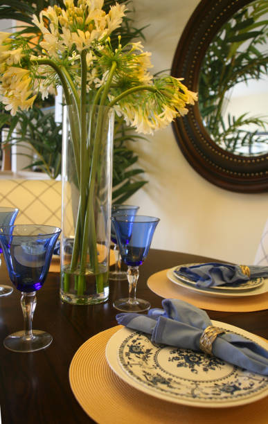 istock Table with Floral Arrangement and Place Settings 108128680