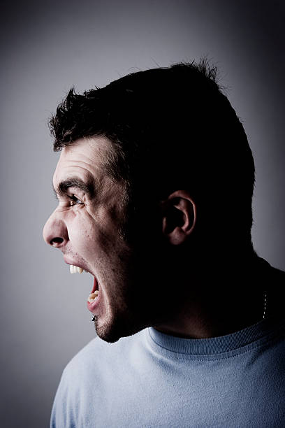 istock Side Profile Portrait of Man Screaming 108128712