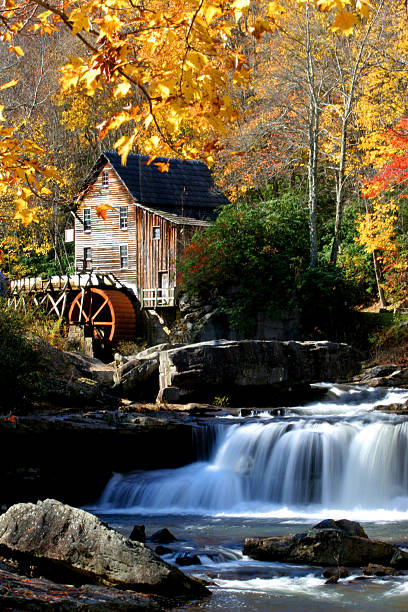 istock Autumn Waterfall and Watermill with House 108128882