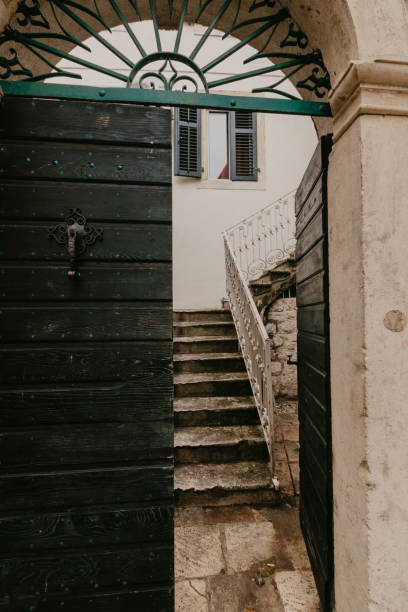 istock old green doors that lead to the courtyard 1081291732