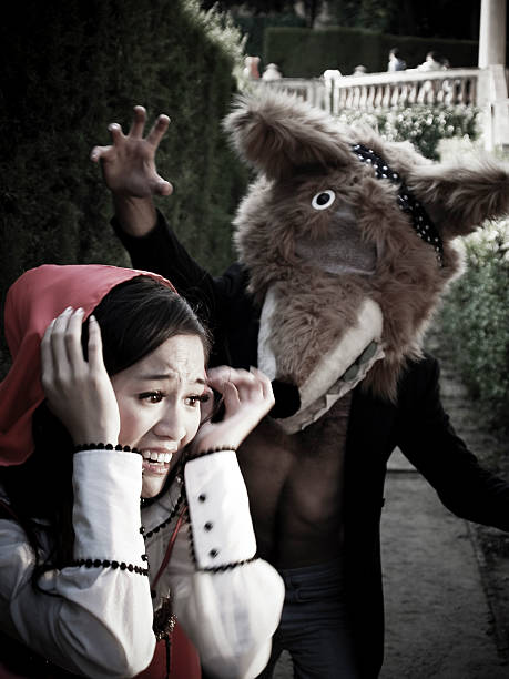 Little Red Riding Hood Running Away From Wolf