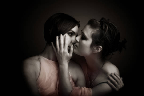 istock Female Couple Kissing, Low key 108129609