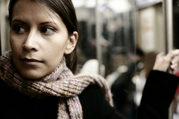 istock Young woman riding the subway back home 108129802
