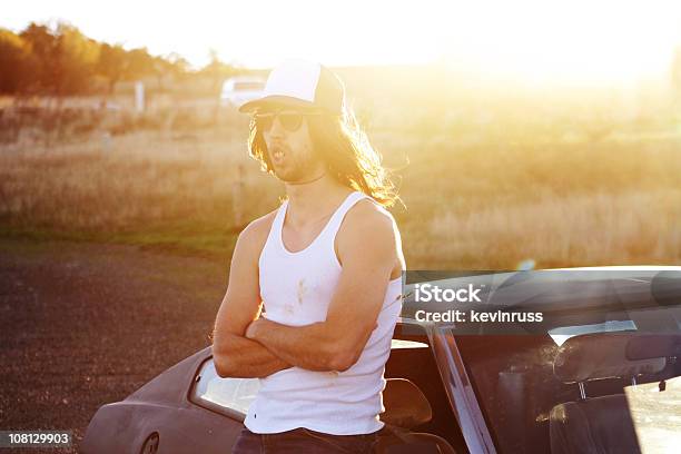 Young Redneck Standing By Car Stock Photo - Download Image Now - Hillbilly, Only Men, Beard