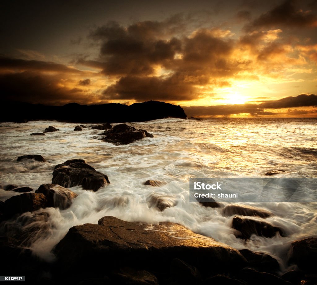 Puesta de sol costa - Foto de stock de Aire libre libre de derechos