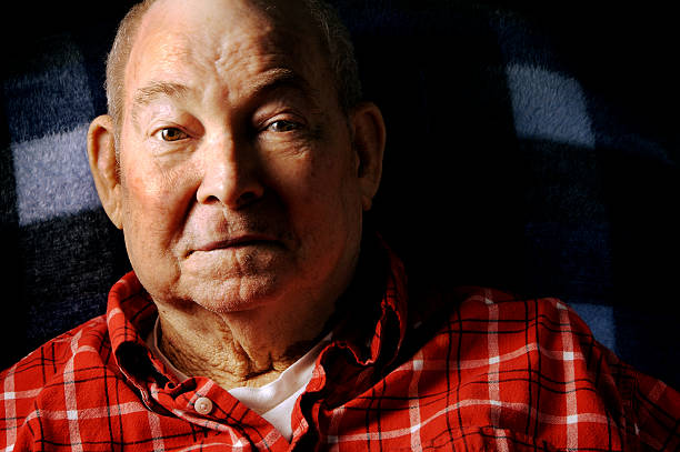 istock Smiling Senior Man Wearing Red Flannel Shirt 108129938
