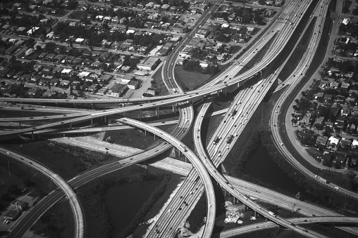 Aerial view of traffic moving on highway in city, California, USA.