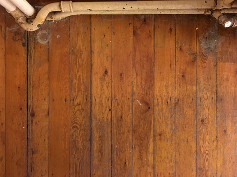 Top view on an old parquet floor. Can be used as a background.