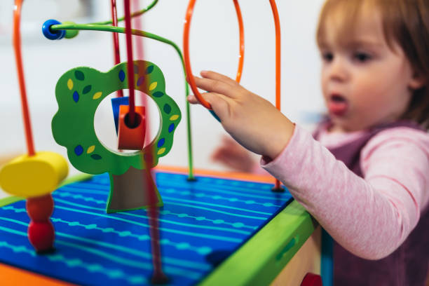 istock Cute child playing on table indoor 1081309692