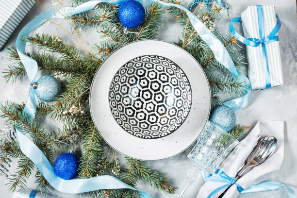 istock Beautiful Christmas table setting with decorations. Preparation for christmas dinner. 1081314858