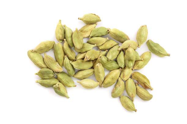 istock Green cardamom seeds isolated on white background. Top view. Flat lay 1081323732