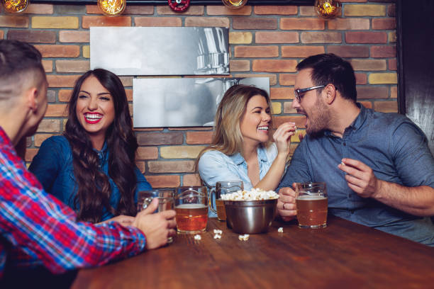 istock Two couples went on a double date to pub on a saturday night. 1081331230