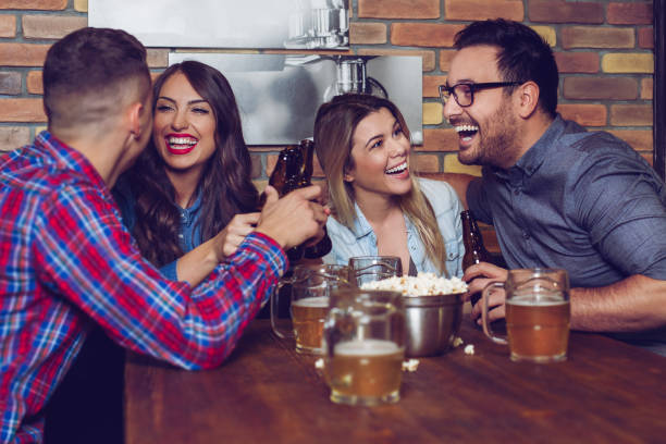 istock Two couples went on a double date to pub on a saturday night. 1081331316