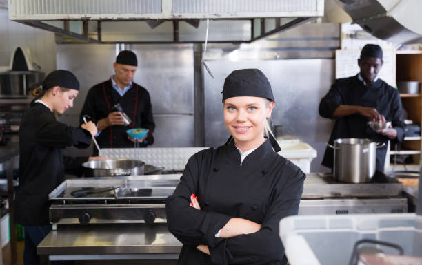 istock Confident young woman chef 1081335872