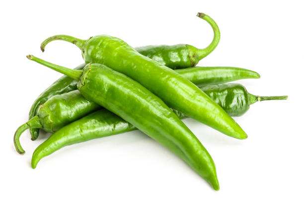 istock green hot chili peppers isolated on white background. Top view. Flat lay pattern 1081343588