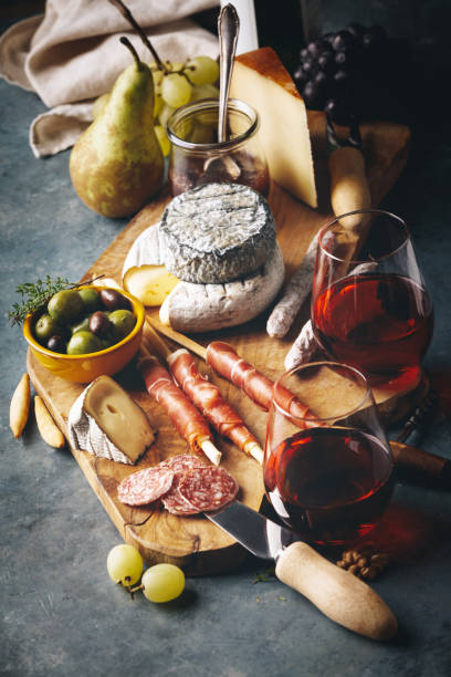 istock Red wine with charcuterie assortment on the stone background 1081349220