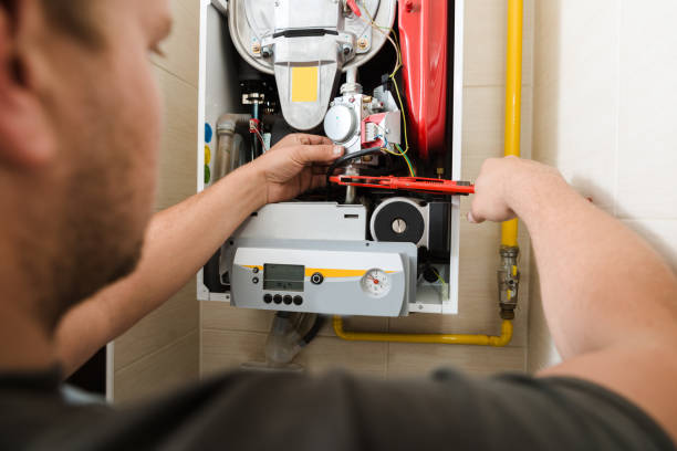 istock Technician repairing Gas Furnace 1081359792
