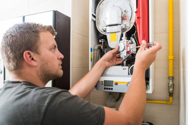 istock Technician repairing Gas Furnace 1081369046