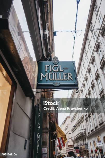 Sign Outside Figlmuller On Wollzeile Restaurant In Vienna Austria Stock Photo - Download Image Now