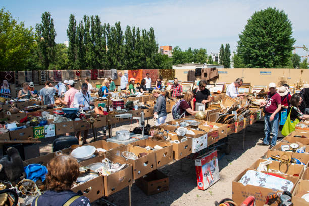 Berlin, Germany - May 27, 2018: People shopping at the popular Flohmarkt am Mauerpark flea market in Berlin, Germany, which is set up every Sunday