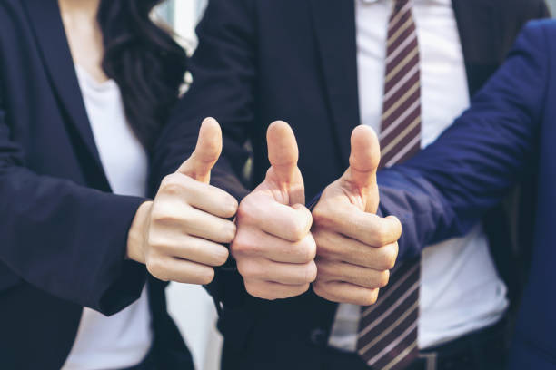 istock Team business partners giving Thumb up Successful teamwork partnership , business concept 1081380450