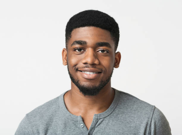 istock Young smiling african-american man over white background 1081381240