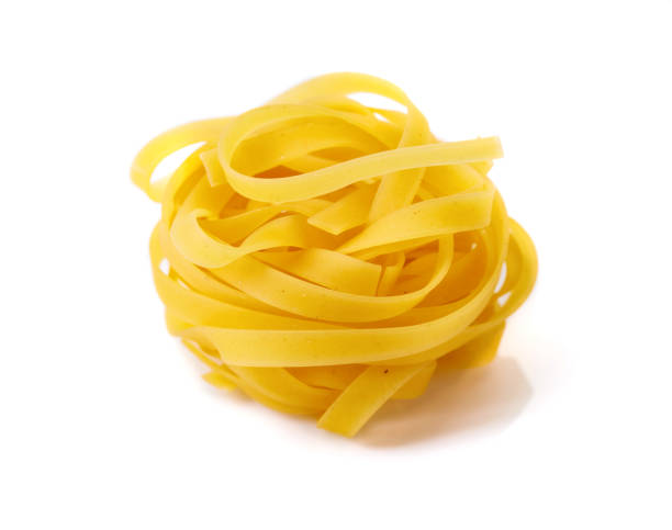 istock Homemade raw egg noodles on a white background. 1081383040