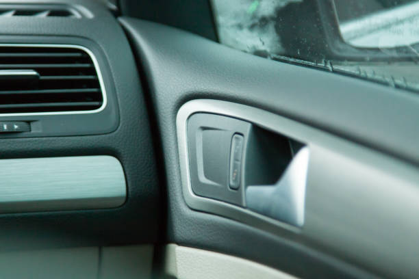 istock view interior cars. control elements. reflections on the glass. for decoration and design. view of the car mirror. kar controls the reflection. selective focus 1081383714