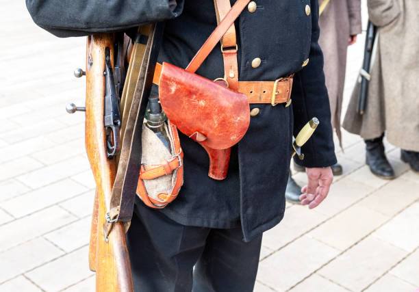istock Vintage leather holster and other ammunition on the belt 1081384610