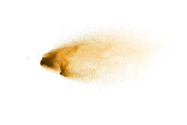 istock Dry river sand explosion. Golden colored sand splash against white background. 1081392128