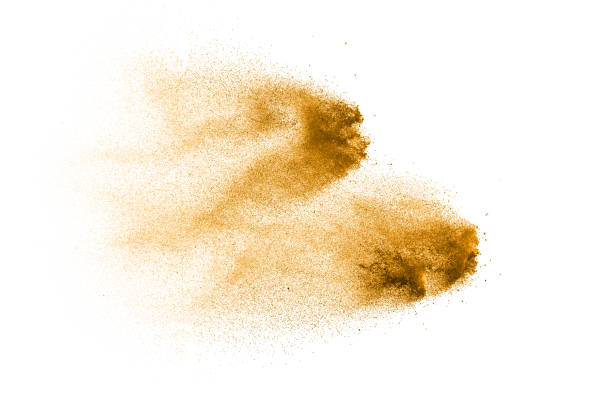 istock Dry river sand explosion. Golden colored sand splash against white background. 1081392162