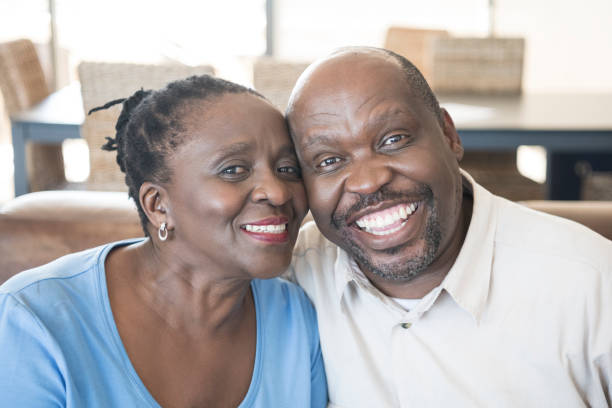 istock African couple smiling towards camera 1081392740