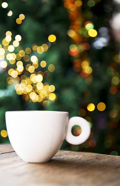 istock Tasty cappuccino with some blurred lights on Christmas tree. 1081400342