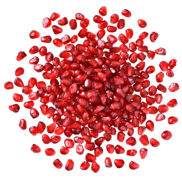 istock Cut the pomegranate with scattered grain top view isolated 1081402406