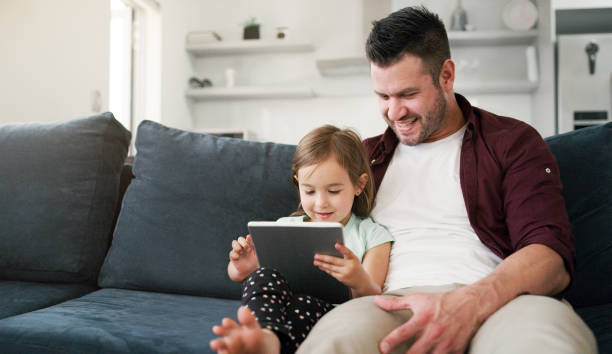 istock Comfy on the couch is where we love to be 1081406180
