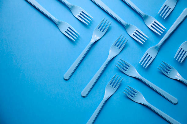 istock Close-up of forks on blue background 1081406974