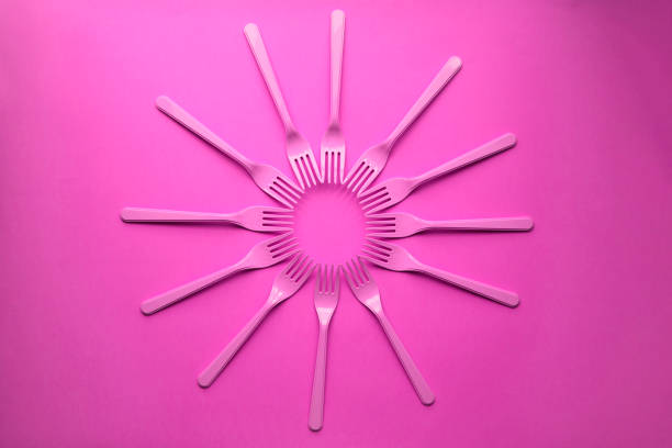 istock Close-up of forks on pink background 1081407162