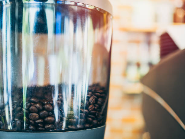 istock Coffee beans in electric coffee grinder 1081413014