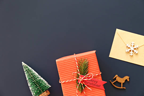 istock Christmas mood concept. Layout composition with traditional festive attributes, presents and other decorations. Winter holidays season. Background, copy space, close up, top view, flat lay. 1081415578
