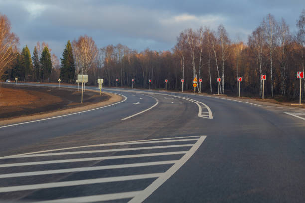 istock Country highway, freshly repaired, sunny autumn day 1081417676