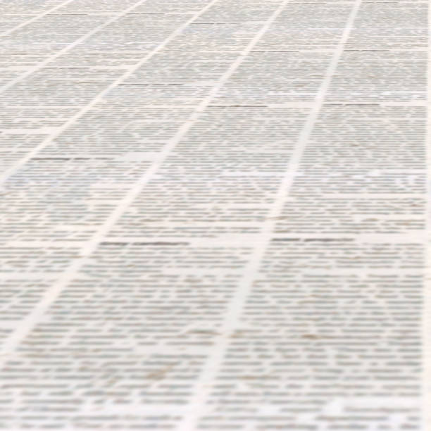 istock Newspaper with old vintage unreadable paper texture background 1081428024