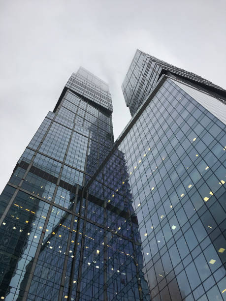 istock Modern building from a low angle, overcast day. fog 1081428846